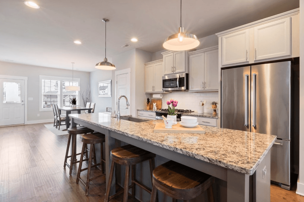 Bright, spotless modern kitchen with island